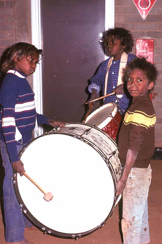 Beating a drum
