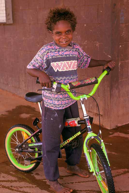 Boy with his bike