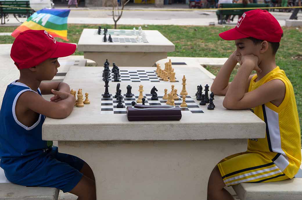 Boys playing chess, Havana