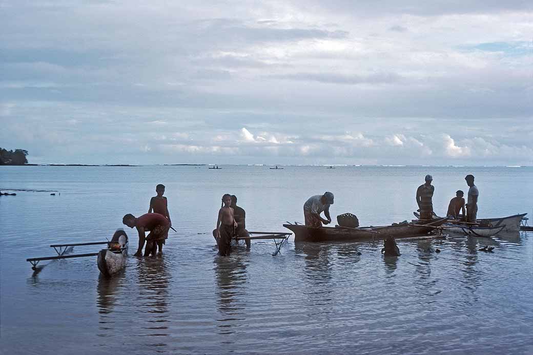 Fishermen with canoes
