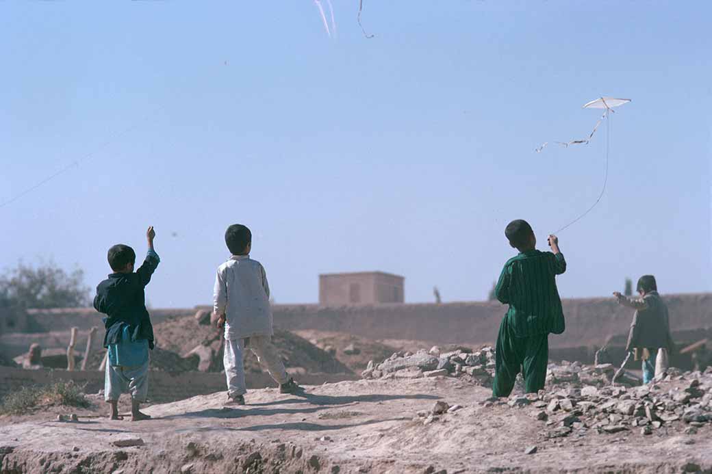 Boys flying kites