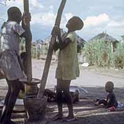 Girls pounding maize, Francistown