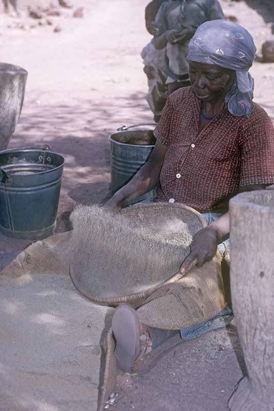 Woman sifting grain, Mochudi