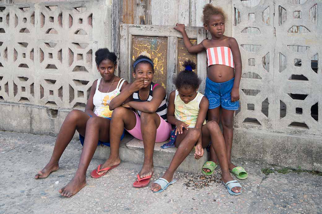 Four young girls in one of the back streets of Santiago de Cuba. 