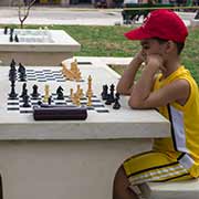 Boys playing chess, Havana