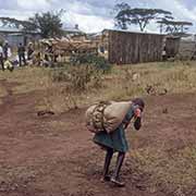 Girl carrying load