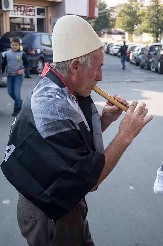 Playing a flute, Prizren