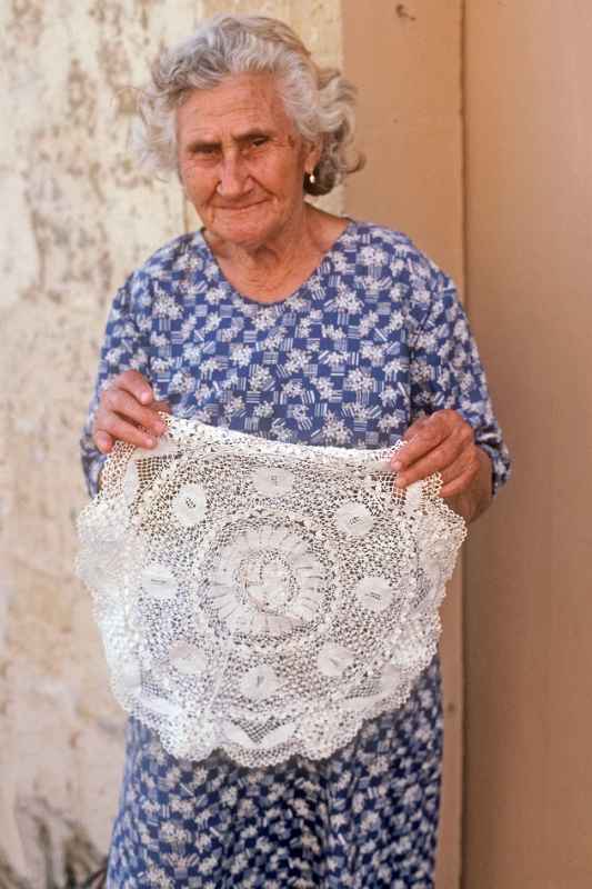 Woman with lace work, Għarb