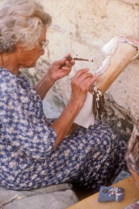 Woman doing lace work, Għarb
