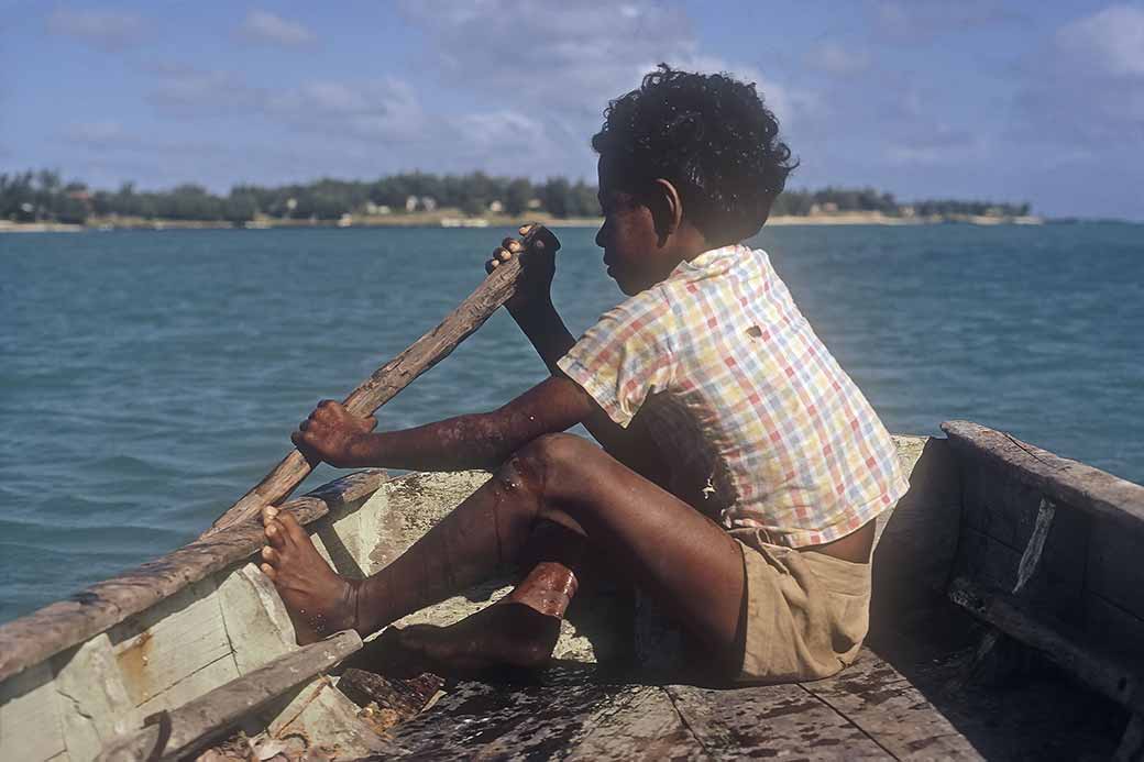 Boy in boat, Cap Malheureux