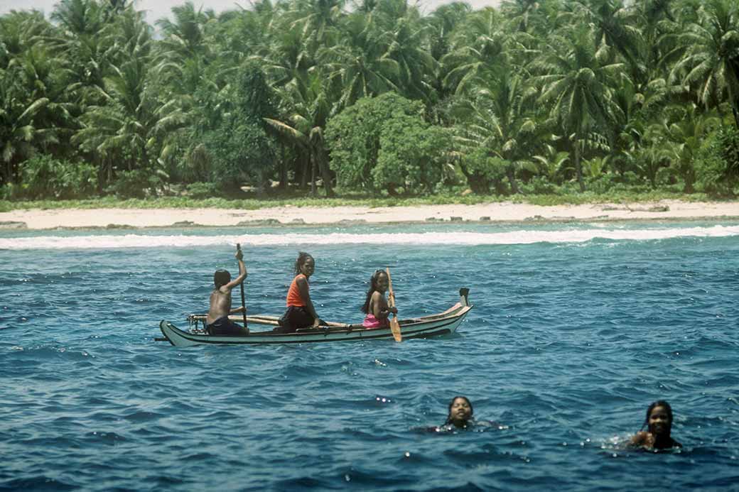 Girls from Tamatam in canoe