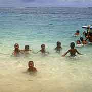 Children in Pulap atoll lagoon