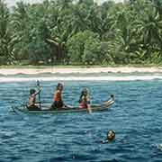 Girls from Tamatam in canoe
