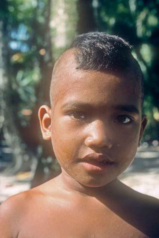 Young boy with hair style | Micronesian Portaits | Micronesia | OzOutback