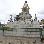 Tibetan stupa and pigeons
