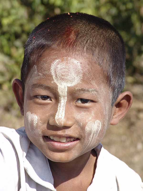 Boy with thanaka paste