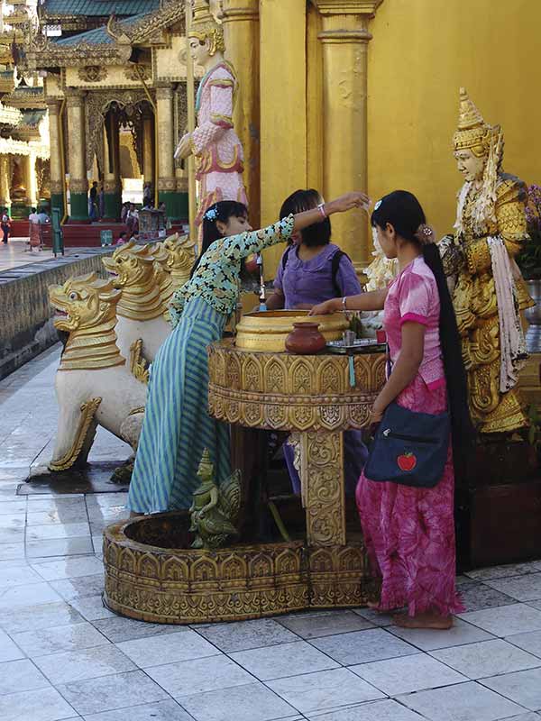 Devotees pouring water