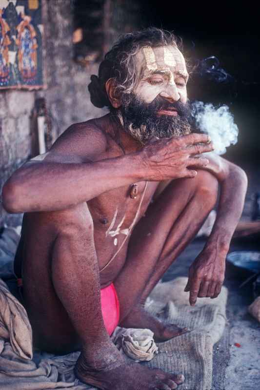 Sadhu smoking a cigarette