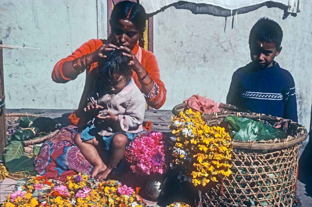 Selling flower garlands