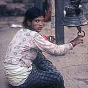 Woman ringing a bell,