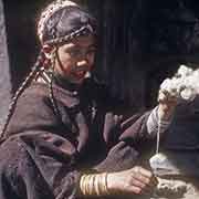 Kalash girl spinning wool