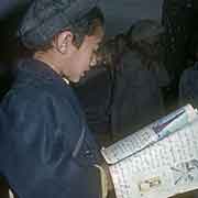 Boy reading in Urdu