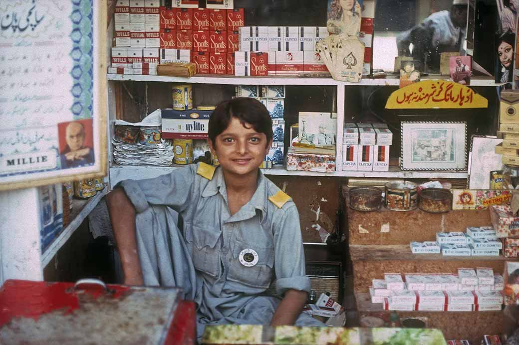 Boy selling cigarettes