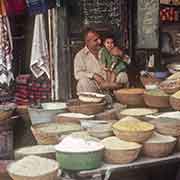 Shopkeeper with his daughter