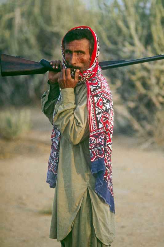 Sindhi hunter with a gun