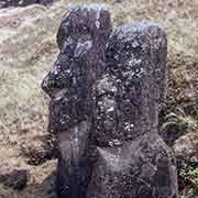 Two moai, with petroglyph
