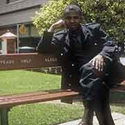 African man on a bench