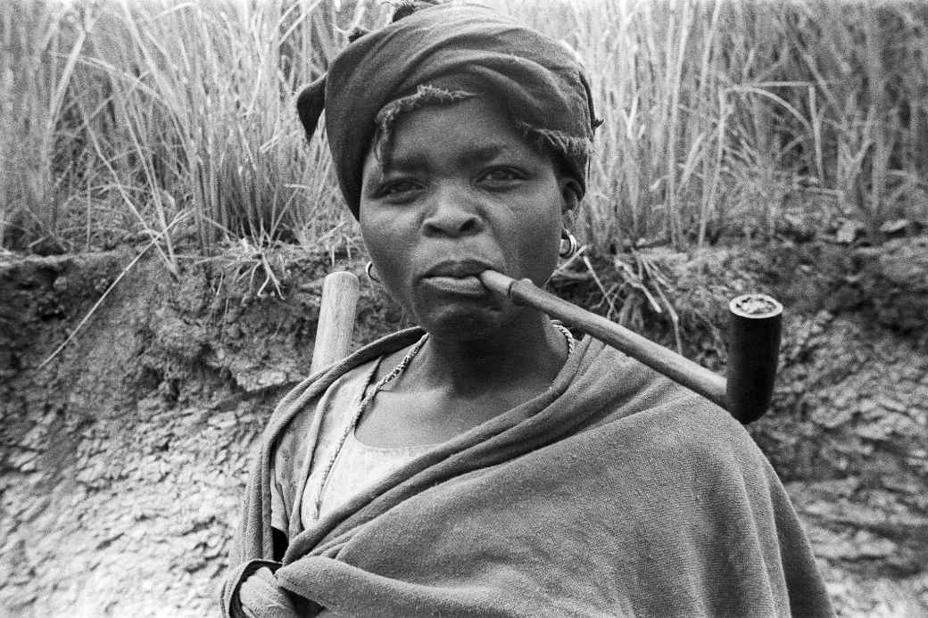 Woman smoking her pipe