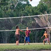 Boys playing volleyball, Palumeu