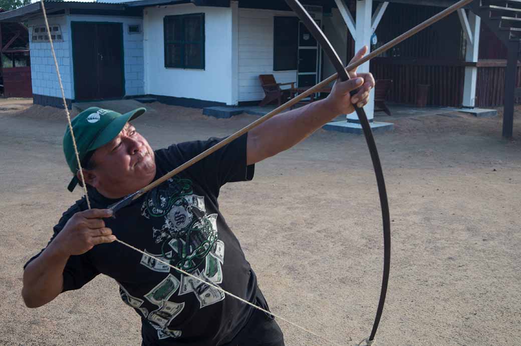 Demonstrating bow and arrow