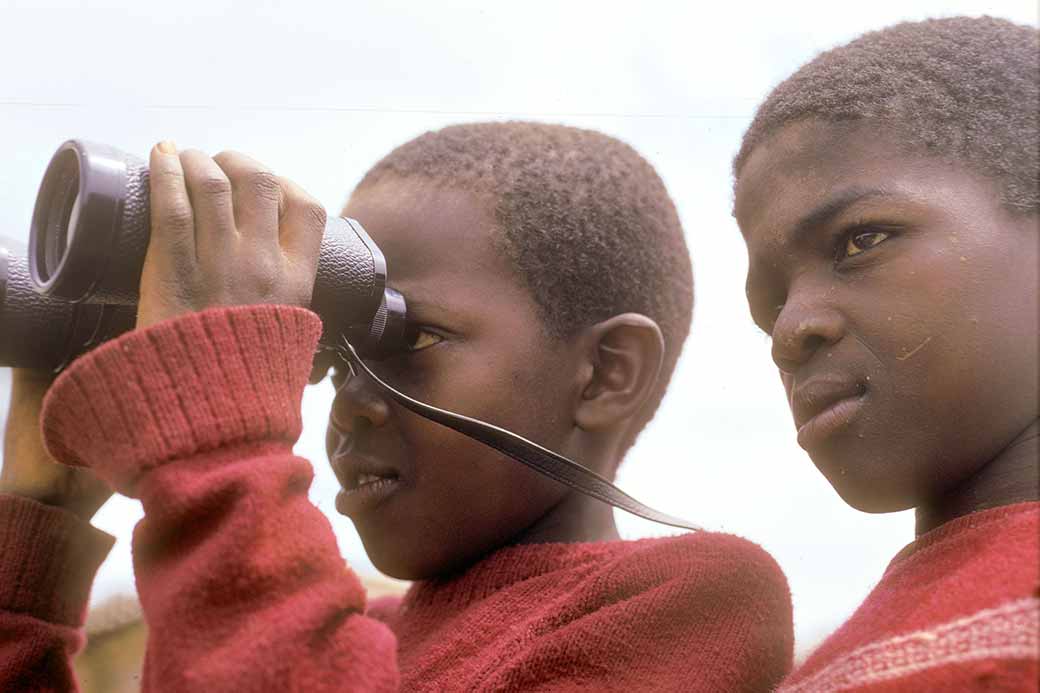 Boys with binoculars