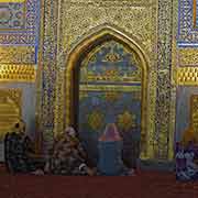 Praying in Tilya-Kori Mosque