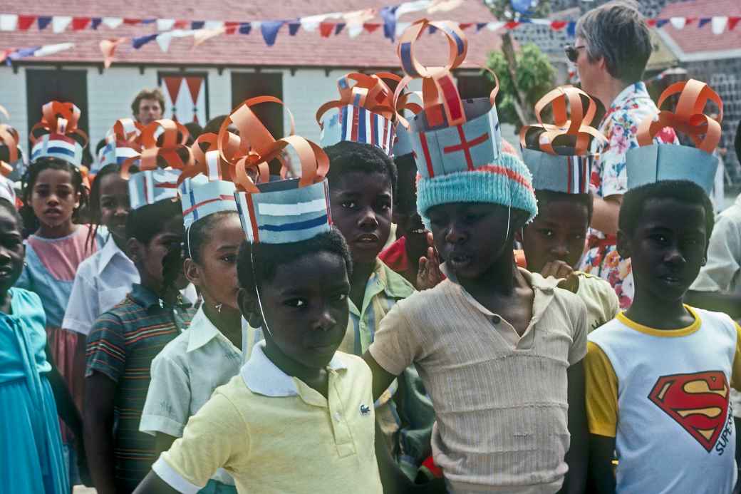 Children with paper crowns