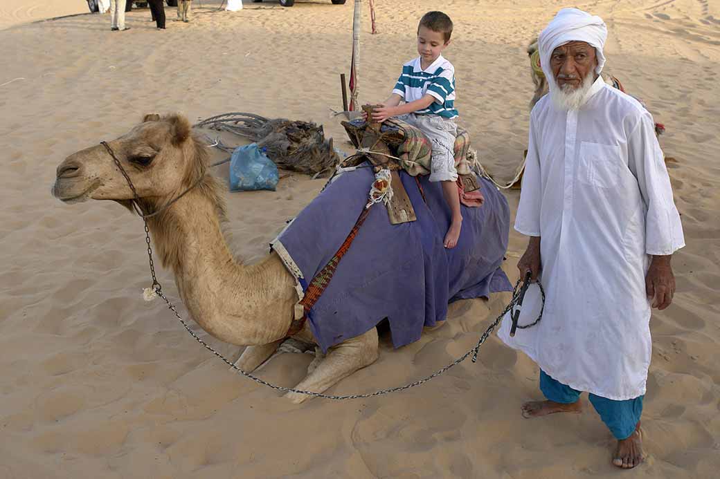 Old man and his camel