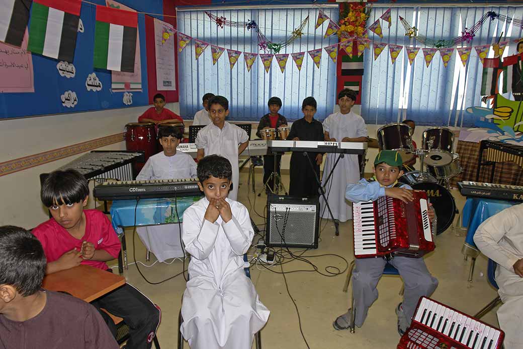 Boys in a music lesson