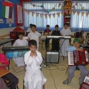 Boys in a music lesson